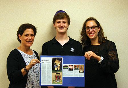 Beth Tfiloh eighth-grader Eitan Murinson presents his project with Jewish Museum of Maryland education director Ilene Dackman-Alon (left) and teacher Lizabeth Shrier. (Rina Goloskov)