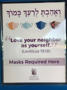 sign reading love your neighbor as yourself