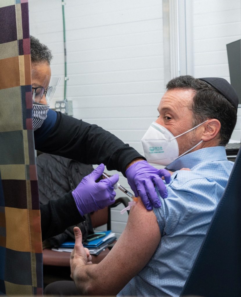 Dr. Dov Frankel receives COVID-19 vaccine