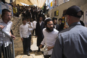 Mourners at the funeral of someone who died at the Lag B'Omer stampede