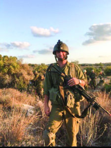 Picture of soldier in uniform.