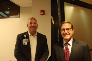 Dan Blum (left) and Neil Meltzer with the Sinai Wellness and Education Suite’s newly hung mezuzah