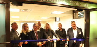 Ribbon-cutting ceremony for the Sinai Wellness and Education Suite, with (from left) Barak Hermann, Laura Rubenstein, Neil Meltzer, Daniel Blum, Beth Goldsmith, Rebecca Altman and Marc Terrill