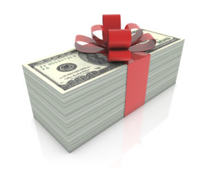 Stack of money wrapped with a bow