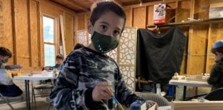 Children use art supplies in Chabad of Ellicott City’s garage facility