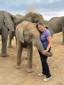Judge Yvette N. Diamond receives a “trunk hug” from a foster elephant at Tsavo National Park, Kenya, 2021