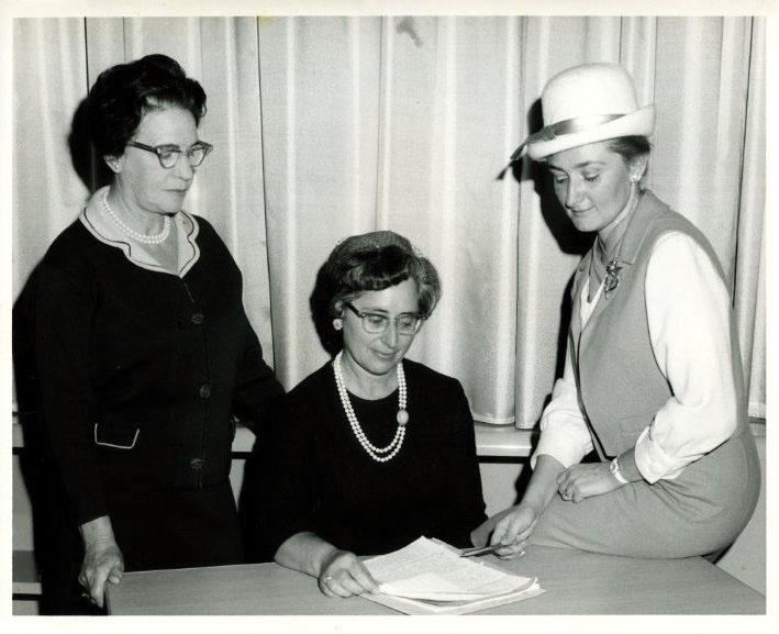 A black-and-white photo of three women