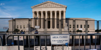 Pro-abortion rights signs in front of the Supreme Court