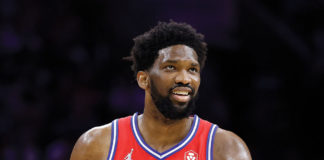 Joel Embiid of the Philadelphia 76ers looks on during the fourth quarter against the Toronto Raptors during a game at the Wells Fargo Center in Philadelphia, April 18, 2022.