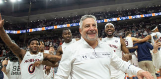 Bruce Pearl celebrates with his team after defeating the Alabama Crimson Tide at Auburn Arena, Feb. 1, 2022.