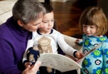 adult reading book to children