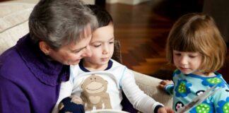 adult reading book to children