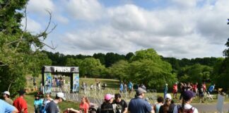 Onlookers wait at the finish line. (Heather M. Ross)