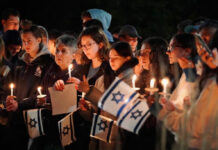 Students hold vigil after Hamas attack on Israel