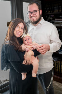 Rabbi Yanky Baron with his wife Leah Baron and daughter Moussia
