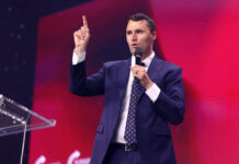 A man holding a microphone.