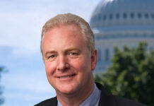 Editorial: A Senator’s Cheap Shot A man wearing a jacket and tie.