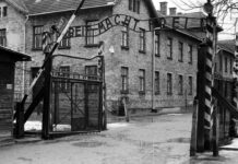 A building with a gate in front of it.