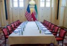 Trump Signs Iran Deal in Versailles
