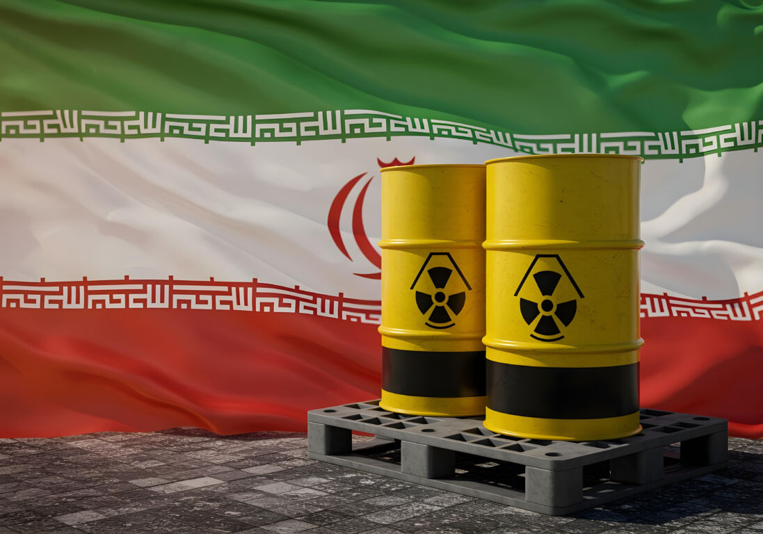 Nuclear waste containers against the Iranian flag