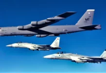 Israeli Air Force F-15s escort an American B-52 bomber through Israeli skies on Feb. 14, 2022.