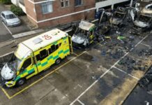 This aerial image shows burnt out ambulances in a parking area along a street in the Golders Green neighborhood of north London on March 23, 2026, after the volunteer ambulances run by a Jewish organization were set on fire overnight.