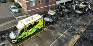 This aerial image shows burnt out ambulances in a parking area along a street in the Golders Green neighborhood of north London on March 23, 2026, after the volunteer ambulances run by a Jewish organization were set on fire overnight.