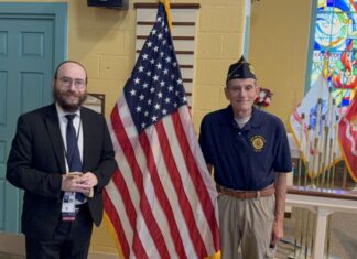 JUSA Chabad Marks Rosh Hashanah, Sept. 11 With Services for Veterans JUSA Director Rabbi Chesky Tenenbaum with Charlie Jay, the new Commander of the Department of Mid-Atlantic & Israel Jewish War Veterans at the Pre-High Holiday Service for Veterans at the Perry Point VA Campus.