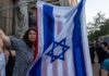 US House Passes Bill Stripping Federal Funds from Universities that Boycott Israel A small group of pro-Israel demonstrators and counter protestors gather in front of Columbia University on August 27, 2024, to hold an "Unmask Campus Hate" protest at the start of the academic year in New York City.
